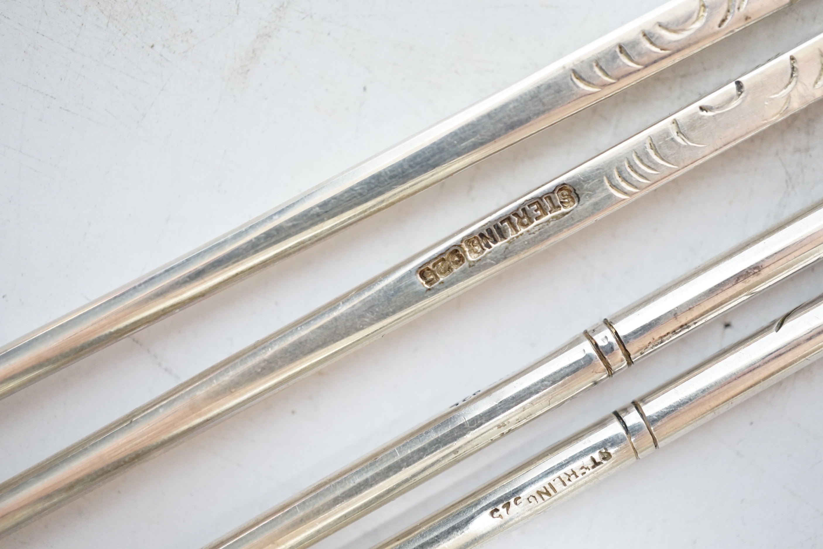 Two pairs of Chinese sterling chopsticks, approx. 23cm.